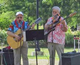 musicians outdoors with guitars