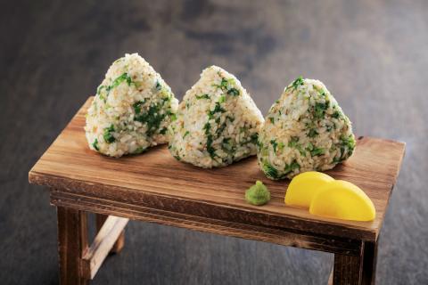 Japanese rice balls on wooded table