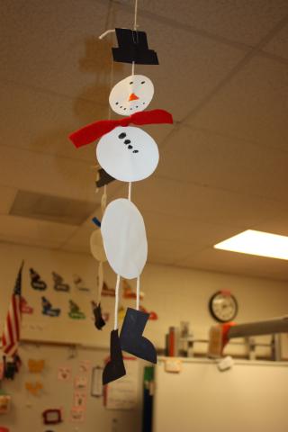 A snowman mobile for your window