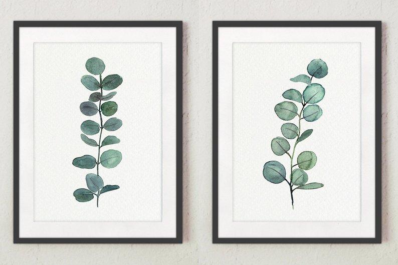 two matching paintings of plants