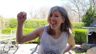 Librarian demonstrating a fingerplay for children