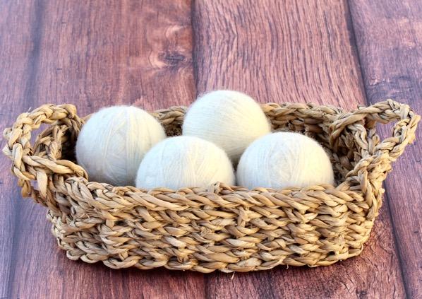 wool dryer balls in a basket