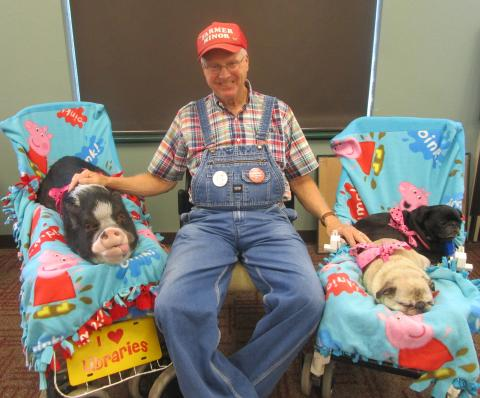 farmer minor with daisy the pig and the dogs